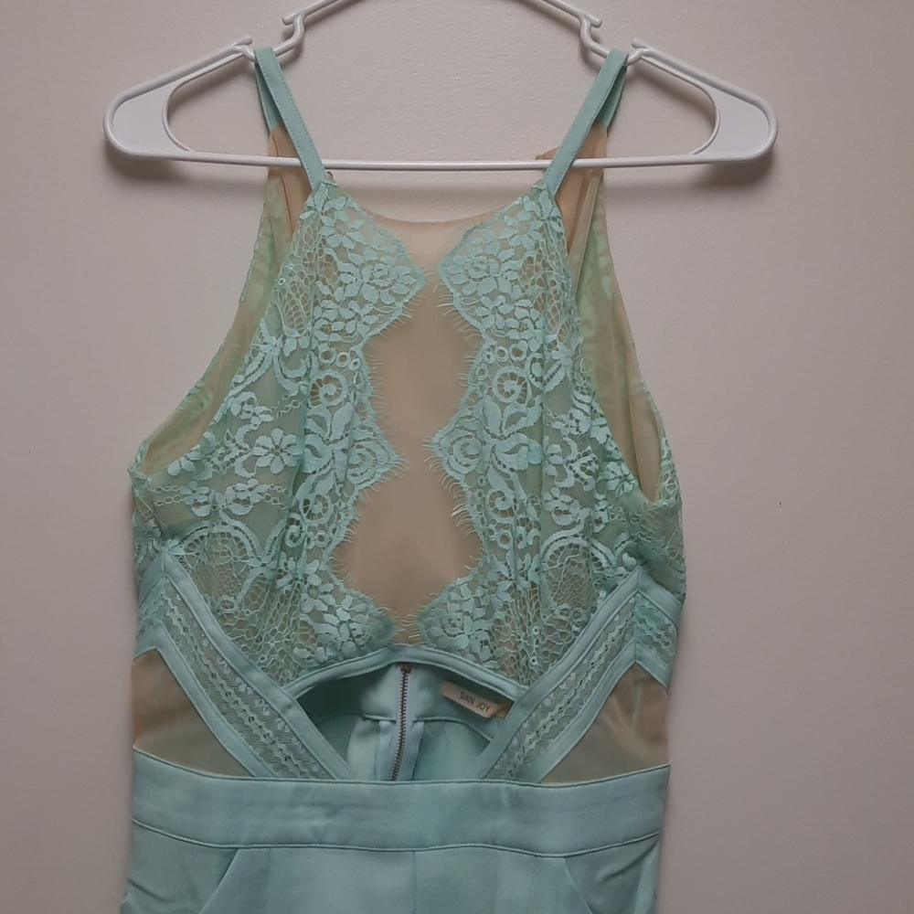 San Joy rompers. See through teal lace.m